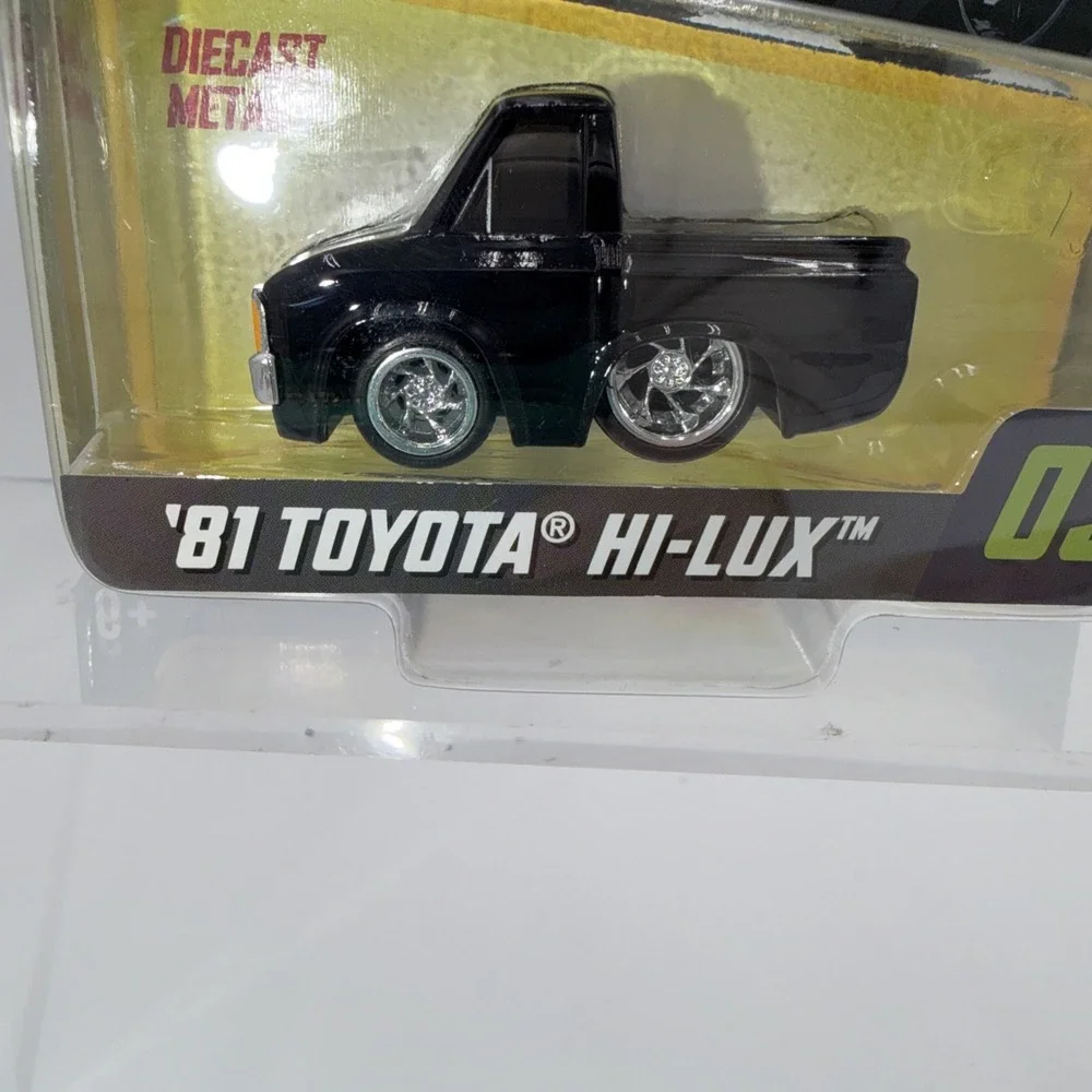 MGA Car Tuned Series 7 Customs '81 Toyota‎ Hi Lux 03 NEW 2025